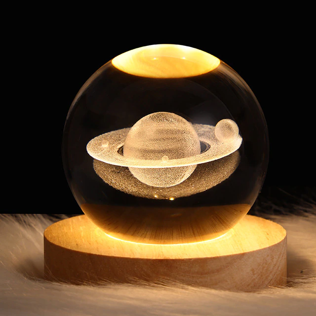 GLOWING PLANETARY GALAXY ASTRONAUT CRYSTAL BALL